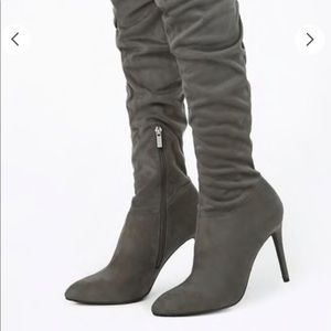 Over the knee high heeled boots